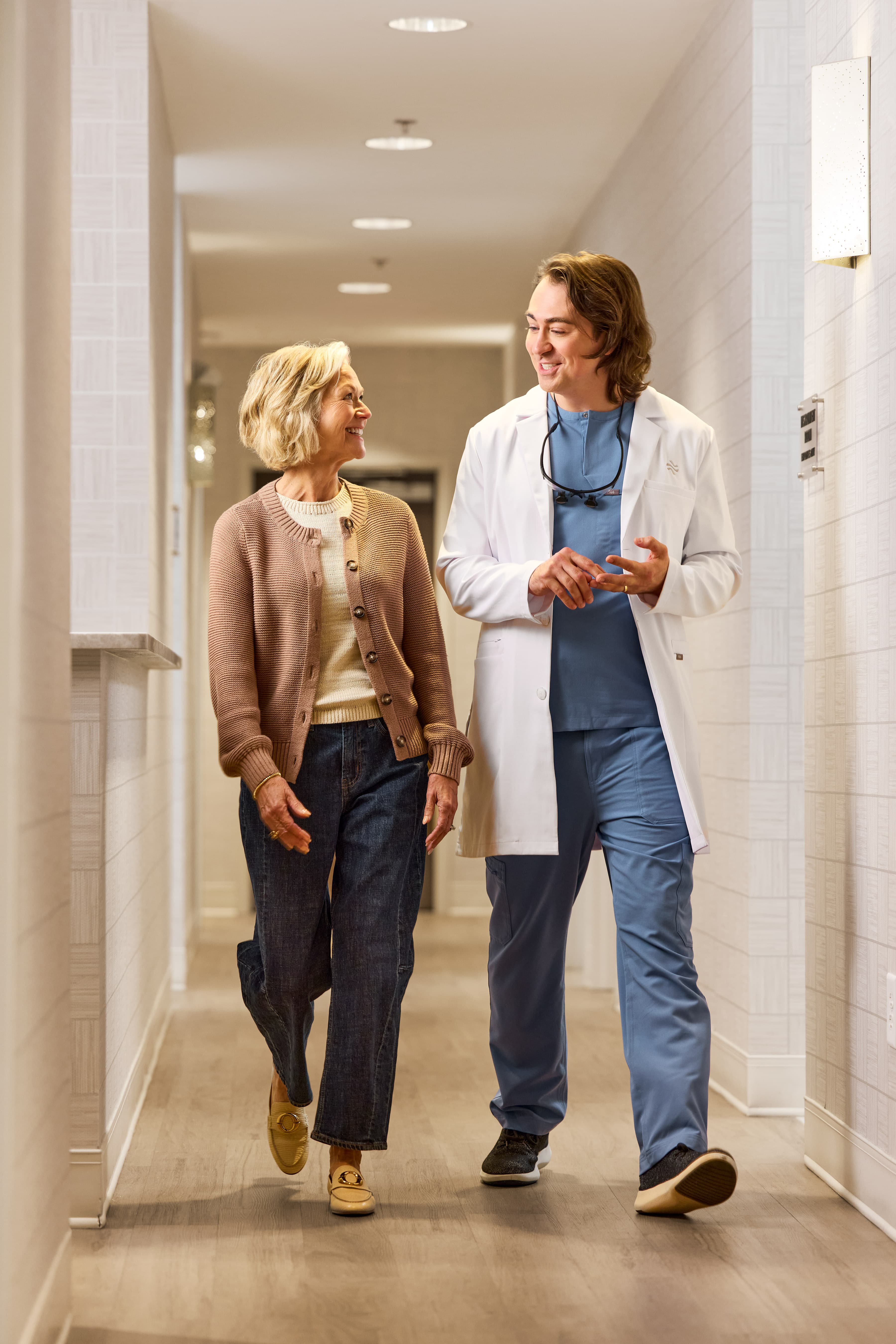 Dr. Tidwell Walking With Patient